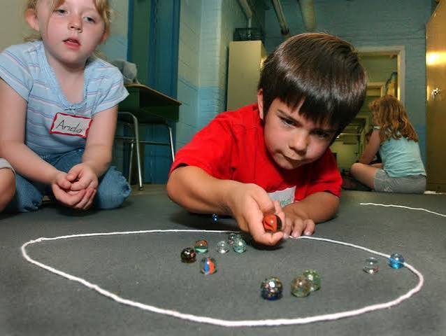 Permainan Benda Kecil Kelereng Sebagai Untuk Anak Indonesia